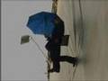 magician ramana hovers in front of a building