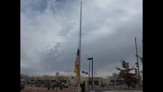 raising the US flag.