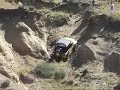 Jeep Sahara climbs a sandy gully the \"easy\" way