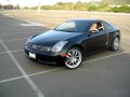 G35 coupe drifts around a light pole!!