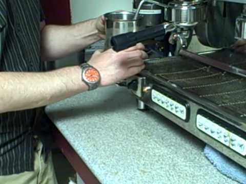 Cleaning the espresso machine