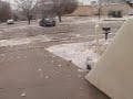 Huge chunks of ice fall from TV tower during 2007 Oklahoma ice storm.  Ice strikes building and a number of vehicles that were parked beneath the tower.