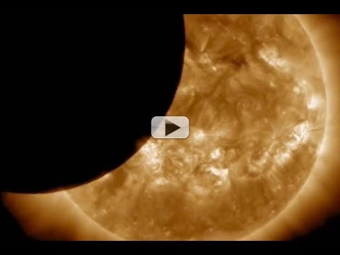 View - NASA's Solar Dynamics Observatory was treated to another lunar transit on Dec 2, 2013. The SDO team compiled the very best views from different imagers onboa...