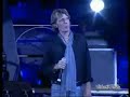 a live performance by stefano picchi and claudio baglioni singing generale kamikaze