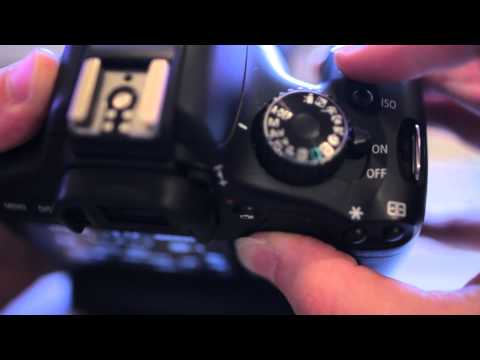 how to adjust f stop on canon xti