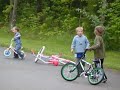 3 year old riding a 2-wheeled bike