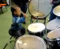 Noah playing the drum