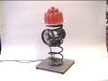 A machine for wobbling jelly, operated by a foot-pedal accelerator.