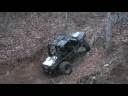videos de Neal flopping over his Suburban
