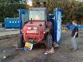 CampZone 2007 Afval stampen in een vuilcontainer? Manitou!
