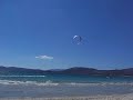 alghero beach kite surfer