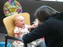 auntie melanie is making faces at austin to make him smile.  i had him at ewu that day.