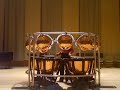 octopus, william kraft (2003) written for david herbert.
extended range of timpani used in william kraft timpani concerto no.2. 

http://www.myspace.com/tenortimpaniproject

more info: http://www.kqed.org/arts/people/spark/profile.jsp?id=4959

support projecttt, the tenor timpani project, click http://www.louis-siu.com