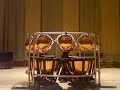 octopus, william kraft (2003) written for david herbert.
extended range of timpani used in william kraft timpani concerto no.2. 

http://www.myspace.com/tenortimpaniproject

more info: http://www.kqed.org/arts/people/spark/profile.jsp?id=4959

support projecttt, the tenor timpani project, click http://www.louis-siu.com