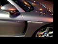 Porsche Carrera GT at a gas station