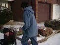 one guy throws snow at another so the other guy kicks his ass!