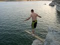 my friend's bachelor party weekend in austin, tx. stopped off for cliff jumping on lake travis. we found a board and jammed it into the rock for jordan to walk the plank.