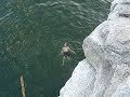 my friend's bachelor party weekend in austin, tx. stopped off for cliff jumping on lake travis. we found a board and jammed it into the rock for jordan to walk the plank.