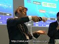Robotic hand picks up egg Robotic hand picks up egg