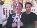 David Duchovny presents an award to Garry Shandling for the Larry Sandlers show at the British Comedy Awards 1999.