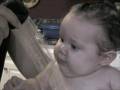 Grace drinks from the faucet