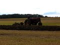 Farmall Super M plowing Farmall Super M plowing