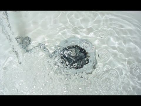 how to unclog a bathtub filled with water