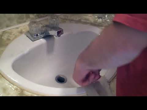 how to unclog a two drain sink