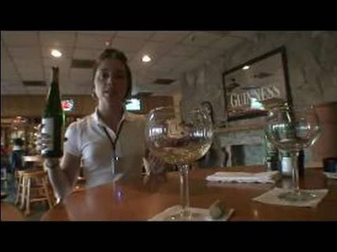 waiter - Learn how to pour wine at the table with expert tips and advice on customer service in this free video clip on waiting tables. Expert: Leslie Moselle Bio: Wi...