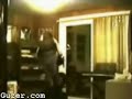 Kid breaks glass window with chair