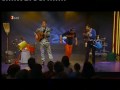 music show in germany by three guys playing only with a guitar and other stuff...