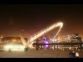 Millennium Bridge tilting with a boat traveling underneath on a dam cold December evening. This uses 330 photographs and is spread over 20 mins in real time.
http://www.gateshead.gov.uk/Leisure%20and%20Culture/attractions/bridge/Background.aspx
Thats the official government bridge website

This is a virtual tour i took of the bridge
http://quicktimevirtualreality.com/fullscreen/NorthEastUK/milleniumbridge/index.html

And this is an image i was commisioned to take
http://quicktimevirtualreality.com/bridge/

This timelapse movie was shot with a Canon 5D with a photo every 3 seconds on a 2.5 second exposure. The aperture was fixed to F3.2 on ISO 400, and it was using a Sigma 17 - 35mm lens, set to 22mm.

The time delay was produced by using the Canon TC80N3 remote timer release.

Regards
Ian