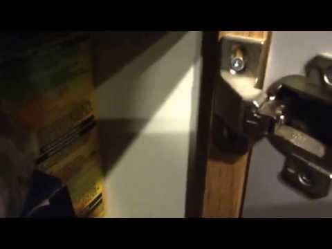how to adjust cupboard door hinges