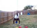 AKC coach Torrin Rhodan doing snatch kettlebell movements