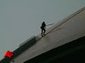 Raw Video: Two Fall From Cowboys Roof Area