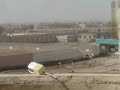 US Marines call in a hellfire to take out insurgents in a bu US Marines call in a hellfire to take out insurgents in a bu