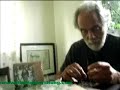 Tommy Chong smoking a dvd wrapper