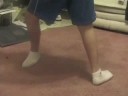 Boy Twisting Leg Around