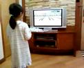 nicole cheng playing bowling in wii