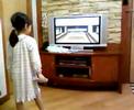 nicole cheng playing bowling in wii