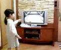 nicole cheng playing bowling in wii