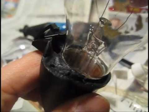 how to remove the light cover on a g.e. refrigerator