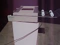 Its the Duplo V350 Form Burster in fine operating condition. It comes with stand. Its 120 volt, 60 hz, 1.2 amps.