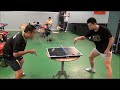 Liu Guoliang vs. Ma Long in mini table tennis!