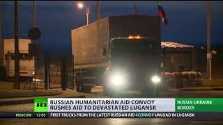 Long-Awaited Relief: Russian Convoy Delivers Aid To Lugansk, E. Ukraine
