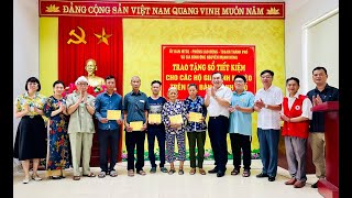 Trao sổ tiết kiệm cho hộ nghèo trên địa bàn thành phố