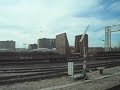 riding alongside a 4 locomotive freight train