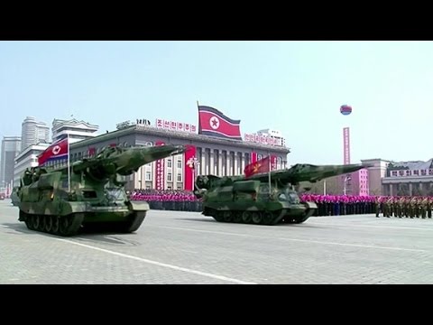North Korea parades new missiles