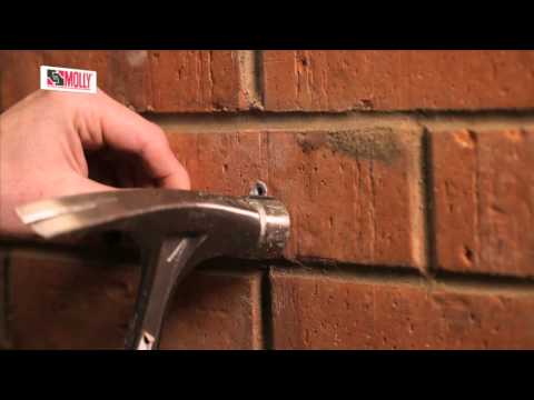how to fasten plasterboard to brick