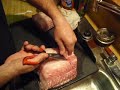 There is a strip of tissue that runs between the backstraps that we want to discard before cooking.